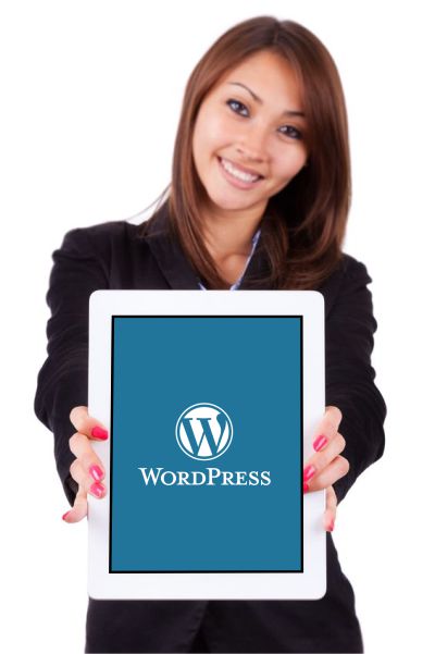 Young Asian woman holding tablet displaying WordPress Logo - Website Design | HarrisWeb Creative